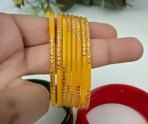 Golden colour chudi shop