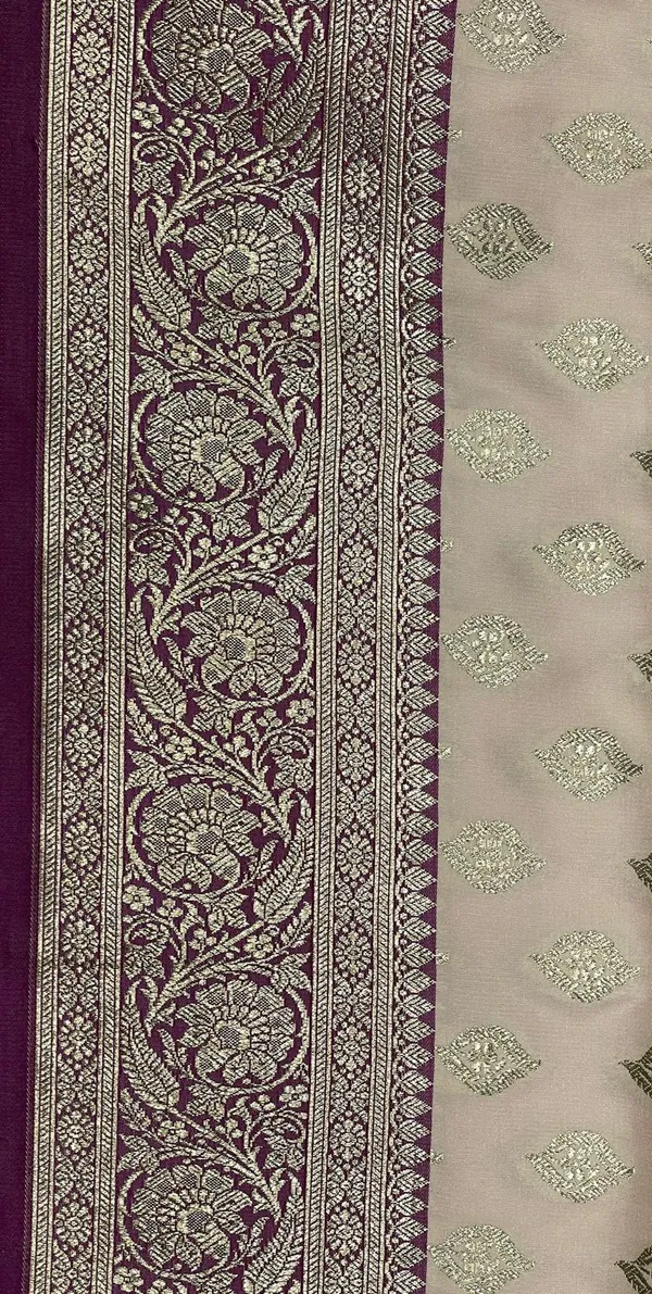 Humairah_Presents_Off-white_Katan_Silk_Floral_Light_Gold_Zari_Booti_with_Contrast_Purple_Floral_Pallu_Banarasi_saree_and_Purple_Blouse
