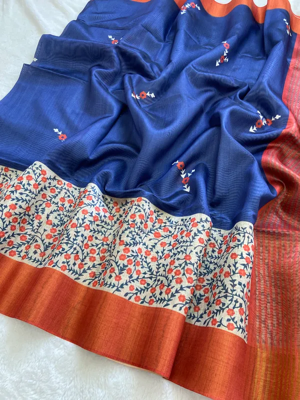 Jivika_Orange_&_Blue_–_Diwali_Special_|_Soft_Tussar_Silk_Saree_with_Print,_Border_&_Contrast_Print_Blouse_with_Tassels