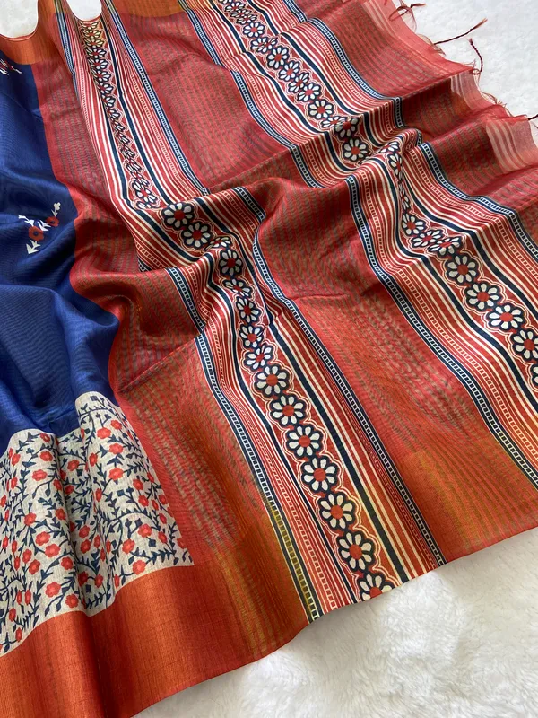 Jivika_Orange_&_Blue_–_Diwali_Special_|_Soft_Tussar_Silk_Saree_with_Print,_Border_&_Contrast_Print_Blouse_with_Tassels