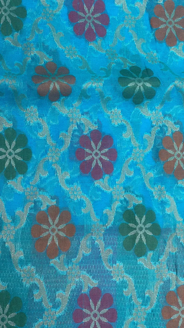 Humairah_Presents_Blue_Semi_Georgette_Alfi_Mina_Floral_Zari_Jaal_Minakari_Zari_Border_with_Banarasi_Floral_Boota_Pallu_and_Blue_Multi_Stripe_Blouse