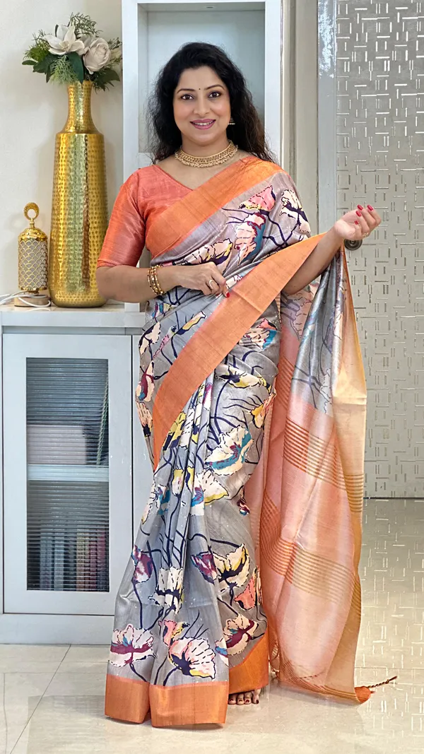 Anusha_Orange_–_Zari_Line_Diwali_Special_|_Soft_Tussar_Silk_Saree_with_Print,_Zari_Line_Saree_&_Print_Blouse_with_Tassels