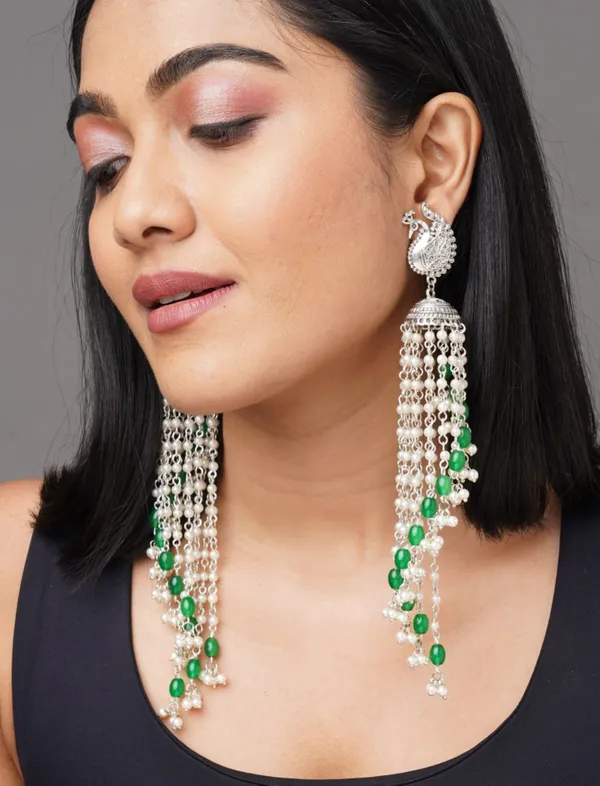 German_silver_peacock_green_drop_shaped_earring