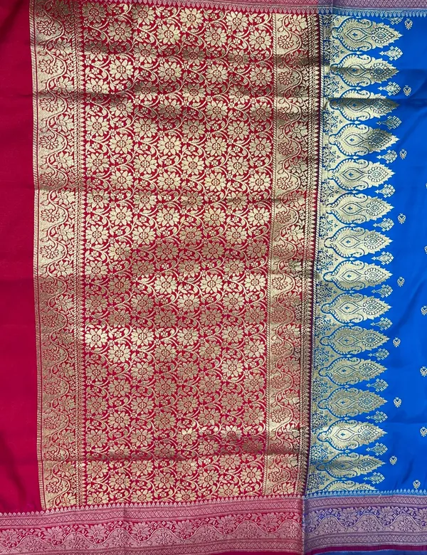 Humairah_Presents_Royal_Blue_Satin_Silk_Gold_Zari_Lachha_Booti_and_Contrast_Red_Floral_Zari_Border_and_Heavy_Gold_Zari_Jaal_Pallu_Banarasi_saree_with_Red_Blouse