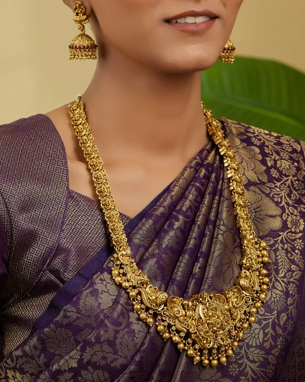 Traditional_South_Indian_Temple_Design_Haram_Set_with_Goddess_Pendant_and_Jhumka_Earrings