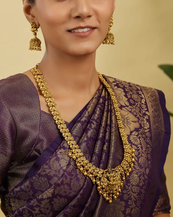 Traditional_South_Indian_Temple_Design_Haram_Set_with_Goddess_Pendant_and_Jhumka_Earrings