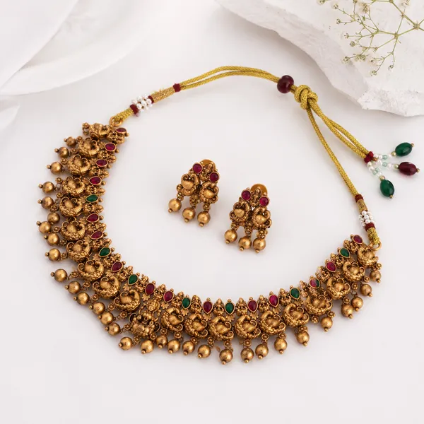 Traditional_South_Indian_Temple_Necklace_Set_with_Peacock_Motif,_Red_&_Green_Stones_and_Jhumki_Drops