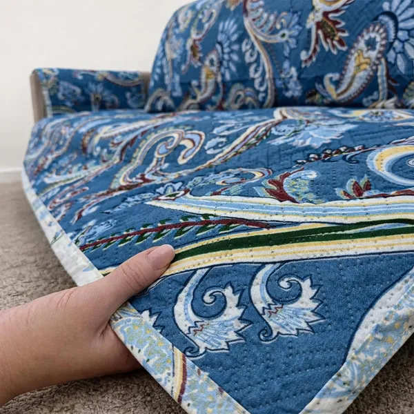 Homerz_Premium_2_Seater_Quilted_Reversible_Sofa_Cover_Mat_with_Pocket_Arms_|_Polyester_Blend_350_GSM_Full_Coverage_&_Back_Belt_for_Stability_(Floraya,_2_Seater)
