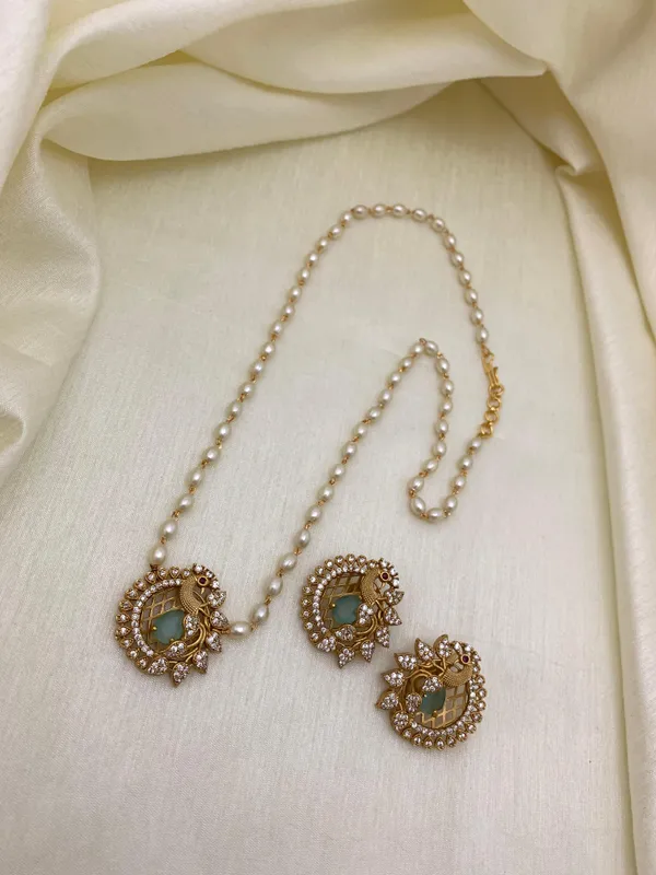Ethnic_Pecock_Pendant_with_Pearl_Mala_set