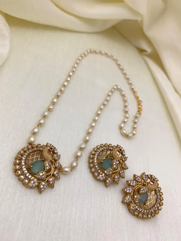 Ethnic_Pecock_Pendant_with_Pearl_Mala_set