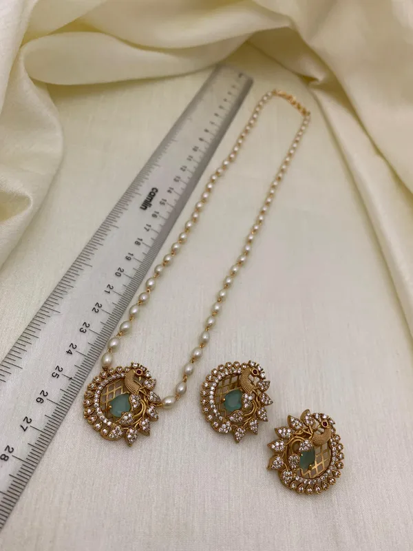 Ethnic_Pecock_Pendant_with_Pearl_Mala_set