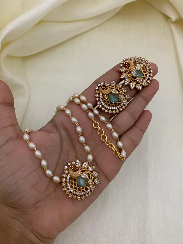 Ethnic_Pecock_Pendant_with_Pearl_Mala_set