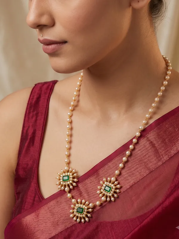 Bani_Statement_Ad_With_Pearl_Necklace