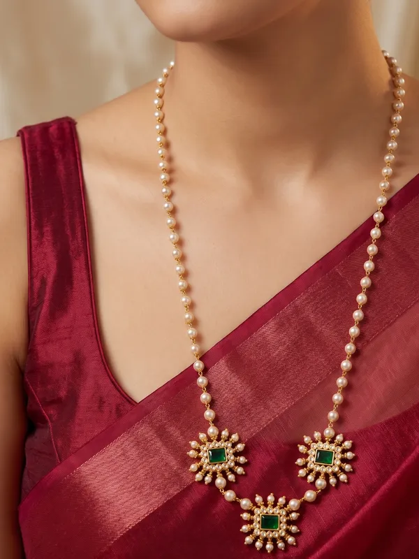 Bani_Statement_Ad_With_Pearl_Necklace