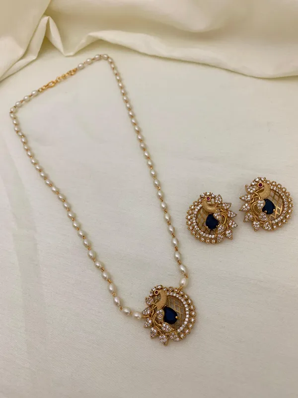 Ethnic_Pecock_Pendant_with_Pearl_Mala_set