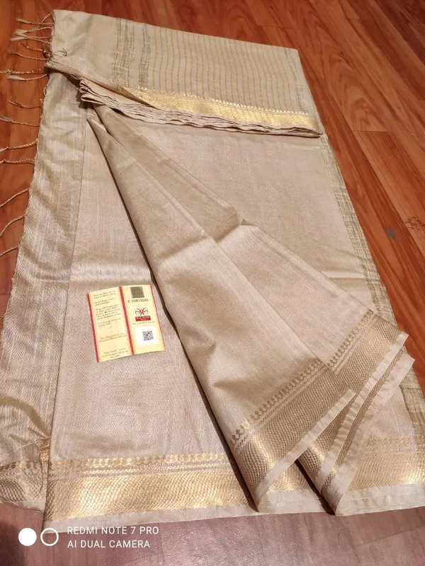 Cream_Exquisite_Semi_Tussar_Silk_Sarees_with_Blouse