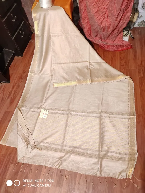 Cream_Exquisite_Semi_Tussar_Silk_Sarees_with_Blouse
