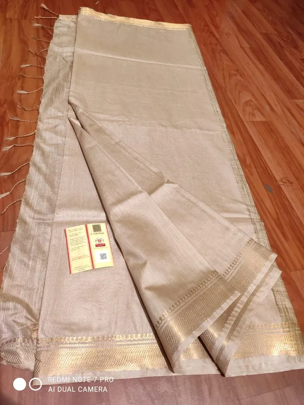 Cream_Exquisite_Semi_Tussar_Silk_Sarees_with_Blouse