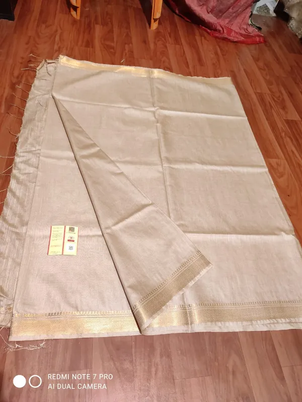 Cream_Exquisite_Semi_Tussar_Silk_Sarees_with_Blouse