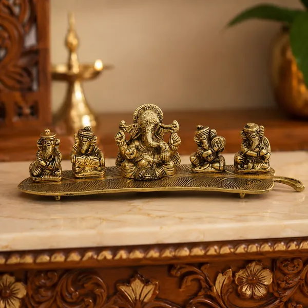 White_Metal_5_Ganesh_with_Musical_Instrument_on_Leaf_for_Home_Dv???vO?cor