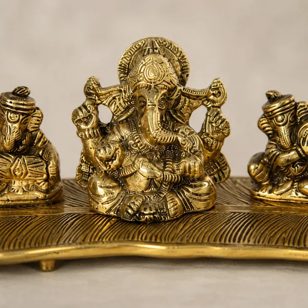White_Metal_5_Ganesh_with_Musical_Instrument_on_Leaf_for_Home_Dv???vO?cor