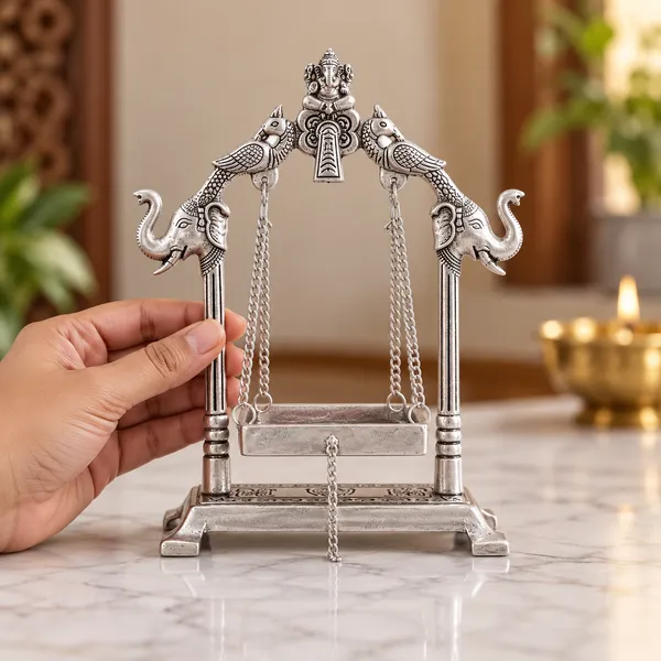 DreamKraft_Metal_Laddu_Gopal_Jhula_with_Elephant_Motifs,_Silver,_19_cm