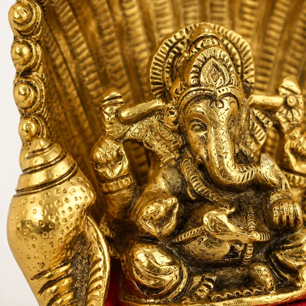 Gold_Plated_Metal_Ganesh_Showpiece_Idol_for_Home_D?cor_and_Gift(15.5X7X13.5_cm)