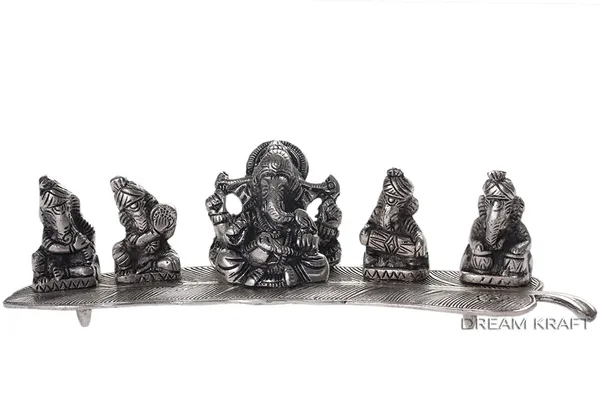 Metal_5_Ganesh_With_Musical_Instrument_On_Leaf,_Standard,_Silver,_1_Piece