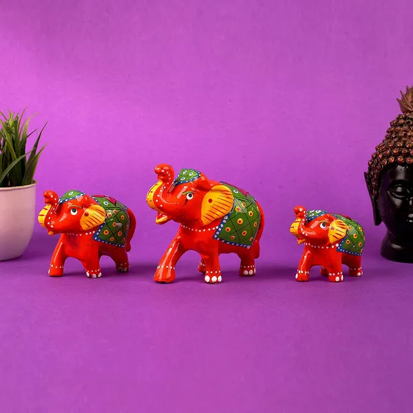 _Handcrafted_Showpiece_Elephant_(Set_of_3,Orange)