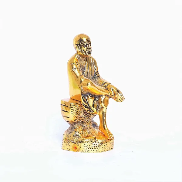 DreamKraft_Shirdi_Sai_Baba_Metal_Idol_on_Rock-Style_Base,_Gold_Colour,_15_cm_Height