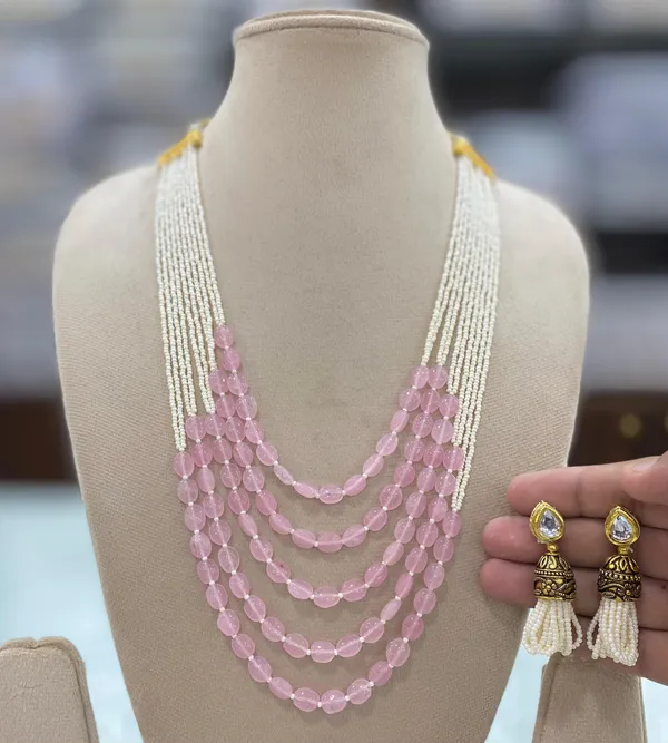 Baby_pink_beads_sophisticated_intricate_gold-toned_necklace_set