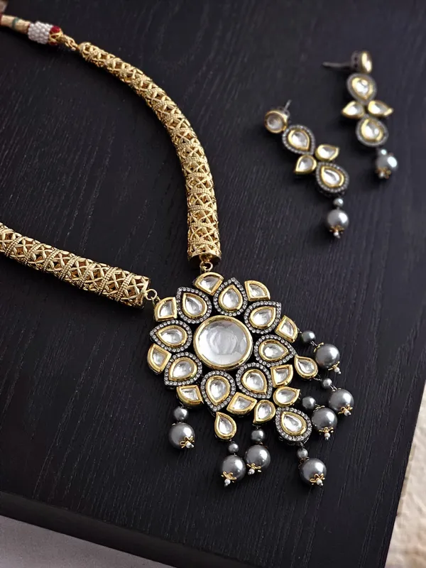 gold_toned_long_traditional_set_with_mang_tika