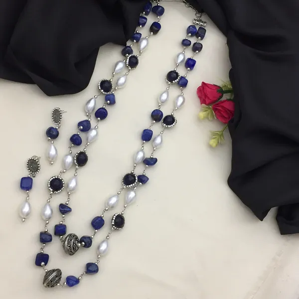 Elegant_Long_Chain_Necklace_Set_-_Blue_&_White_Beads,_Oxidized_Silver_Accents,_Oval_&_Round_Shapes