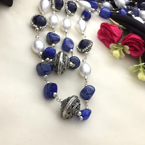 Elegant_Long_Chain_Necklace_Set_-_Blue_&_White_Beads,_Oxidized_Silver_Accents,_Oval_&_Round_Shapes