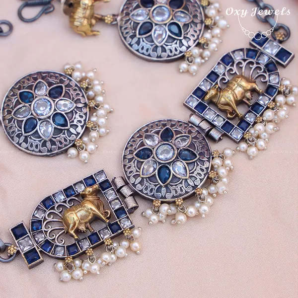 Oxidised_Dual_Tone_Elephant_Motif_Necklace_Set_-_Blue,_Gold,_Round_&_Rectangular_Shapes