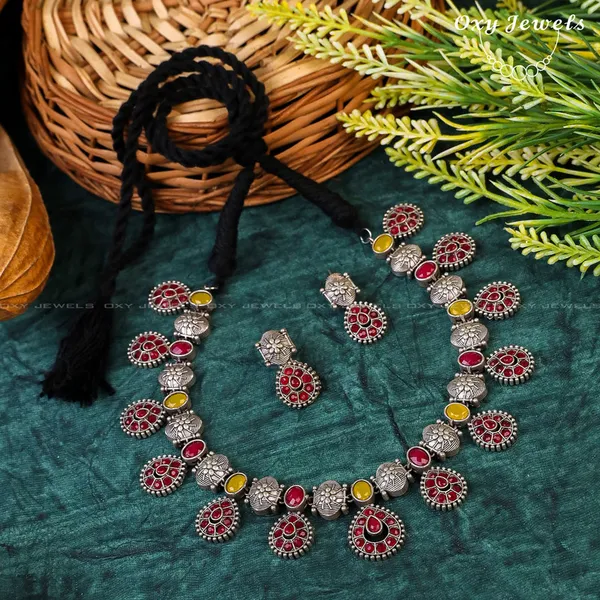 Oxidised_Dual_Tone_Silver_Necklace_Set_with_Red_and_Yellow_Floral_Design