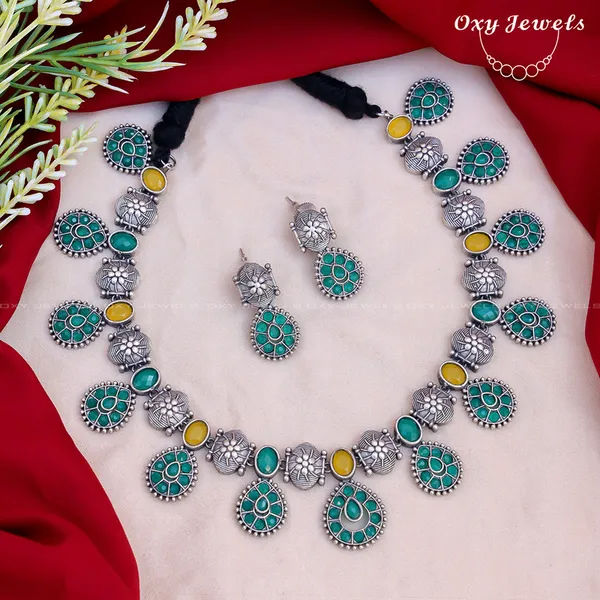 Oxidised_Dual_Tone_Silver_Necklace_Set_with_Green_&_Yellow_Oval_and_Floral_Designs