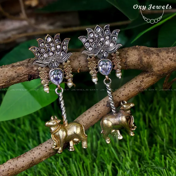 Oxidised_Dual_Tone_Silver_Lotus_and_Bull_Dangle_Earrings_-_Gold,_Silver,_Teardrop_Shape