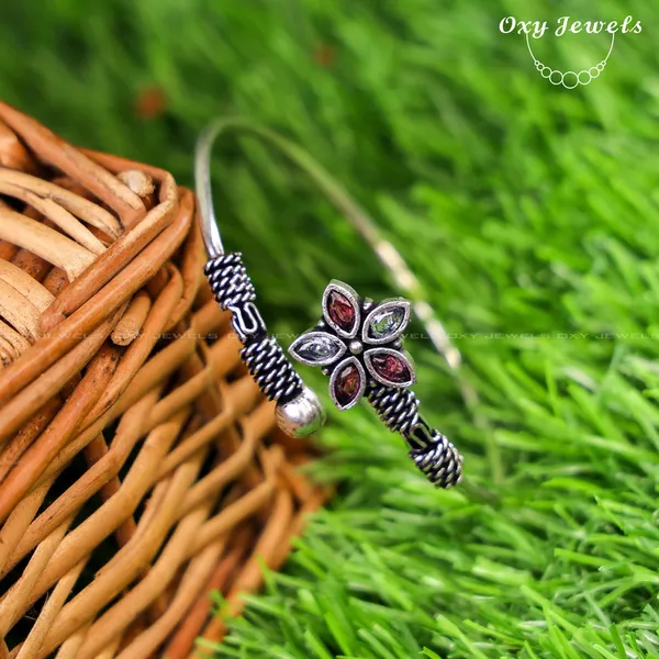 Floral_Oxidised_Silver_Bracelet_with_Pink_and_Blue_Gemstones_-_Adjustable_Open_Cuff_Design