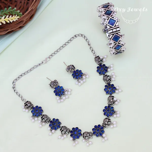 Elegant_Blue_Floral_Necklace,_Earrings,_and_Bracelet_Jewelry_Set