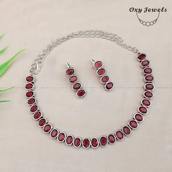 Elegant_Oxidised_Silver_Necklace_and_Earring_Set_with_Red_Gemstones