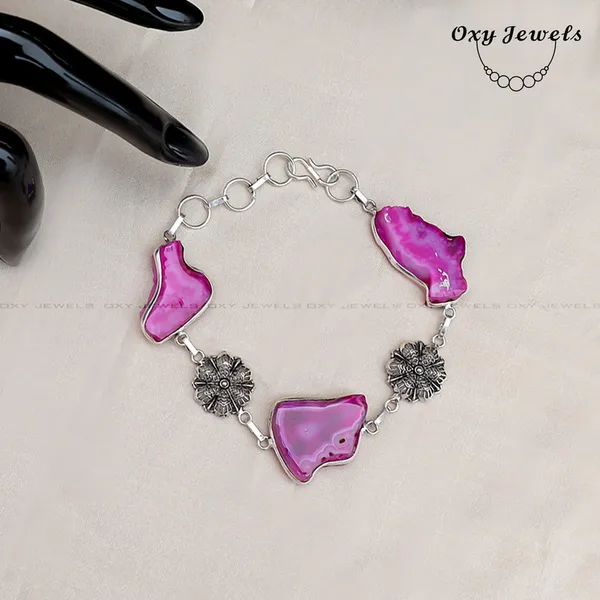 Handcrafted_Oxidized_Silver_Bracelet_with_Pink_Agate_Stones_and_Floral_Accents