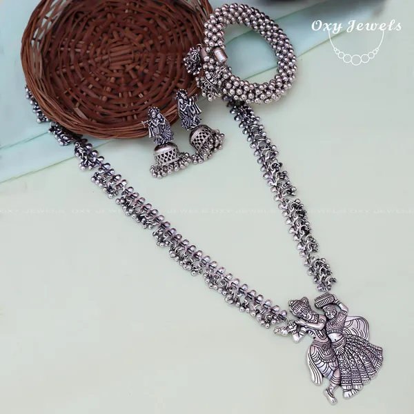 Traditional_Oxidized_Silver_Necklace,_Earrings,_and_Bracelet_Set_with_Dancing_Radha_Pendant