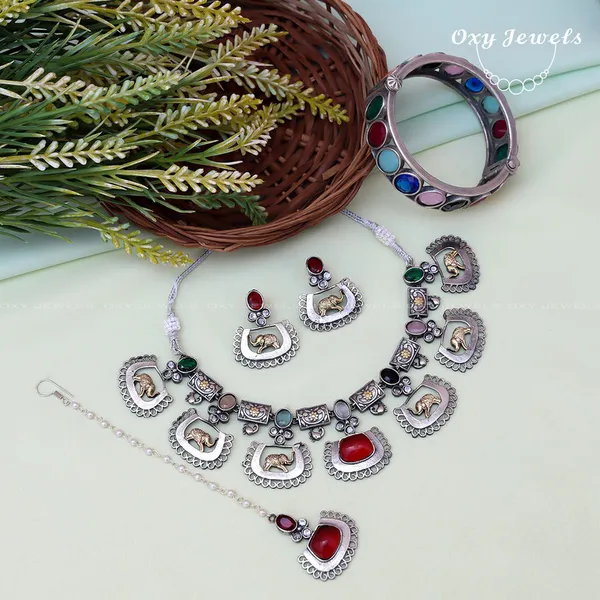 Bohemian_Elephant_Jewelry_Set:_Necklace,_Earrings,_Bracelet,_and_Maang_Tikka_Combo