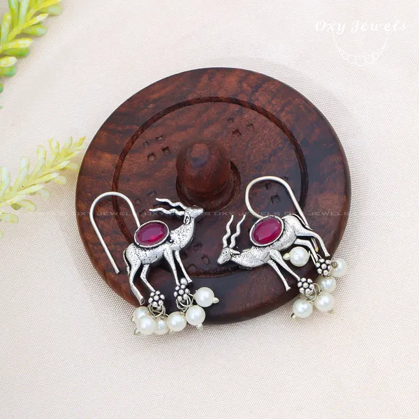 Pack_of_2_-_Oxidised_Silver_Peacock_and_Deer_Earrings_with_Maroon_Stones_and_Pearl_Accents