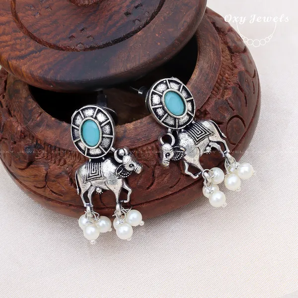 Pack_of_2_-_Oxidised_Silver_Bull_Earrings_with_Turquoise_and_Ruby_Accents