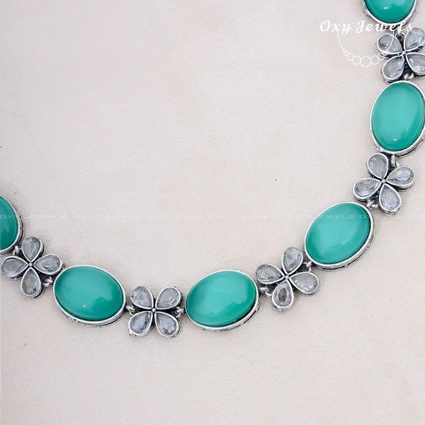 Oxidised_Silver_Necklace_Set_with_Turquoise_Stones_and_Floral_Accents
