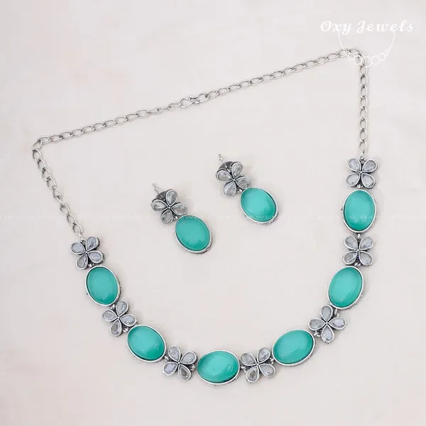 Oxidised_Silver_Necklace_Set_with_Turquoise_Stones_and_Floral_Accents
