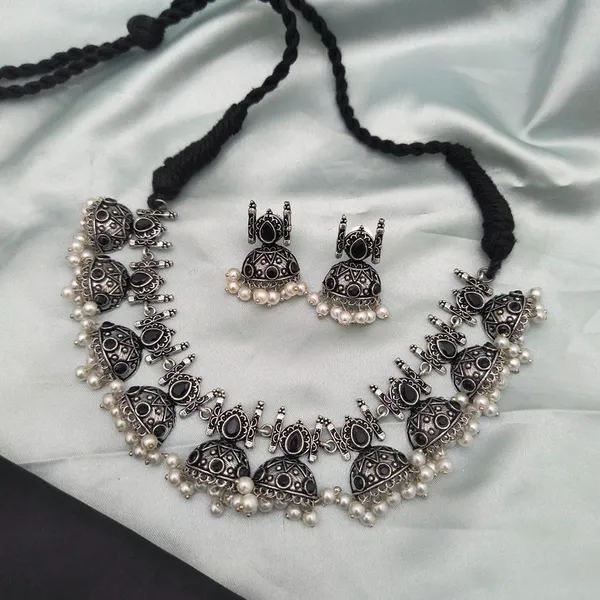 Oxidised_Silver_Necklace_Set_with_Blue_Stones_and_White_Pearl_Accents