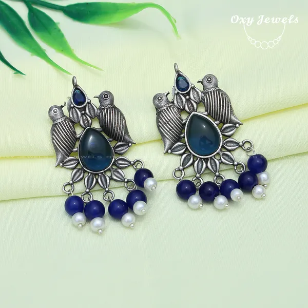 Handcrafted_Silver_Peacock_Earrings_with_Blue_and_Pearl_Beads
